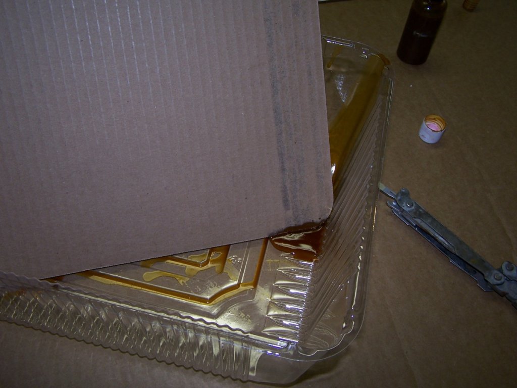 Use a tray to catch and reclaim shellac, and to avoid a mess. I can't remember who suggested this in the thread... but it is a great idea.