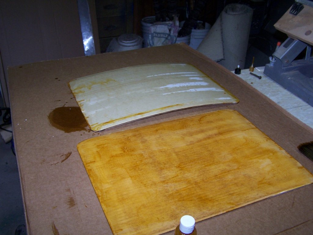 Far panel now has corrugations done, near panel has first coat of shellac on the shiny side. Work fast, this stuff dries quickly! You can see on the far panel a few spots I will need to touch up!