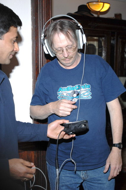 Sunil and Chris listening to headphi/i Pod rig