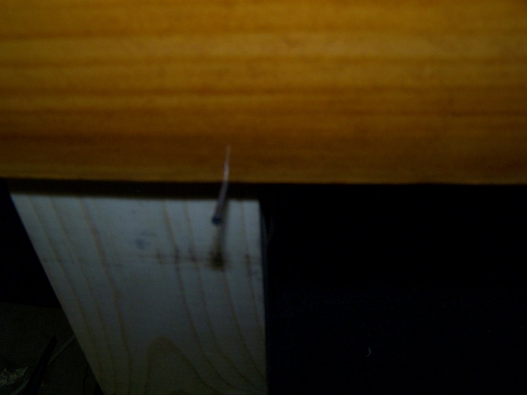 Single finish nail to support panel's weight.