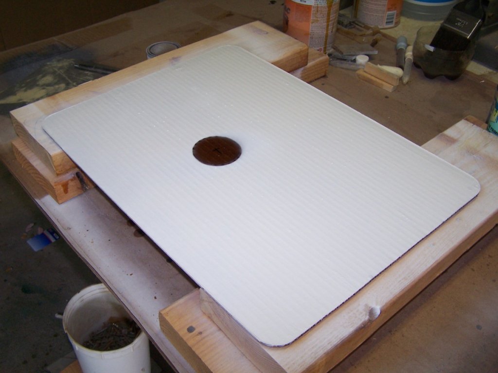 Remove the can and there is a perfect unpainted contact area to attach the exciter.