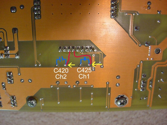Raw Inputs - Remove C420/425 by desoldering from bottom of main board. Yellow indicates input solder point to retain servo connections. Red indicates traces to pins 5 & 6 on Tripath chip.