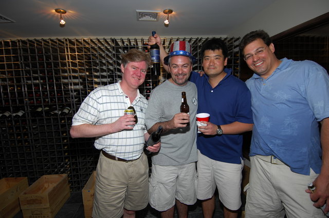 Richard and friends inside the wine storage. All spirited!