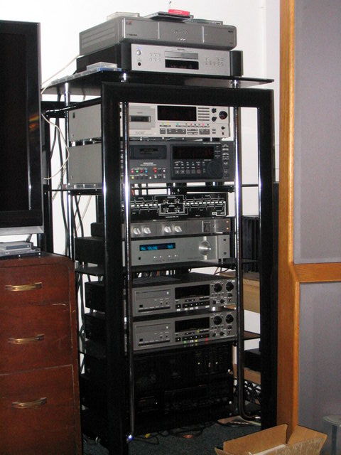Main rack including Pass Labs x-1 preamp, Threshold active crossover, Rotel CD and numerous digital recording decks