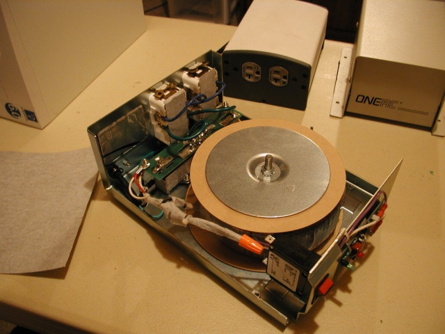 A shot of the Powervar ABC600, ERS wrapped on the incoming power wires, back of the outlets and around the black 