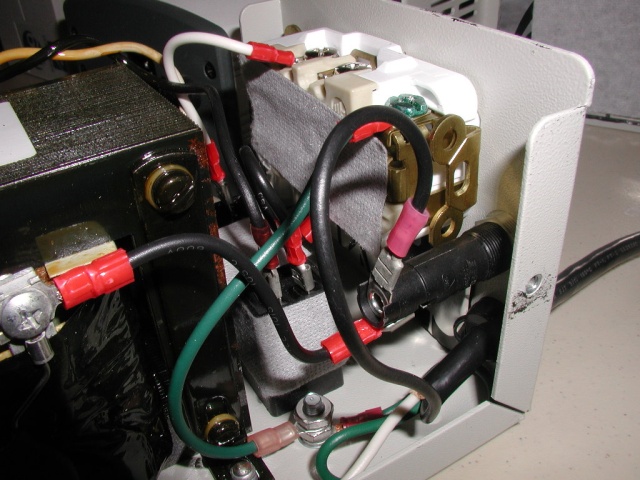 A close detail view of the Oneac 1102, again on the back of the outlet and the 