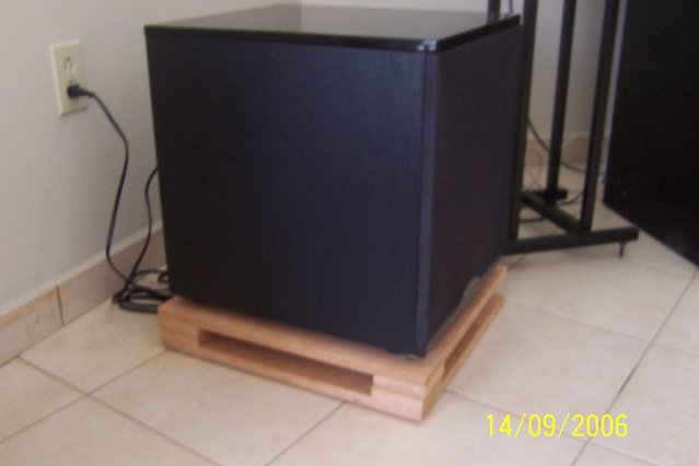 Roller Base: Accoustic Tech H-1000 subwoofer seated on the RB