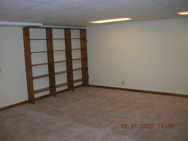 Left front corner and front wall