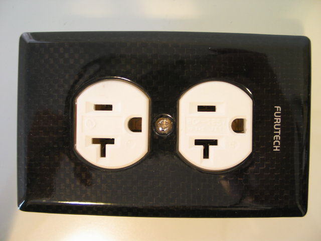 Oyaide R-1 housed in a Furutech carbon fiber faceplate