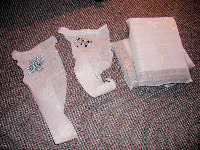 Screws, Spikes, and Bases in their packaging