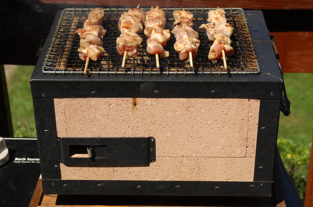 Yakitori chicken being cooked