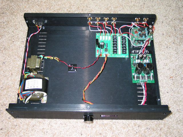 Burson from top/front - R-Core transformer in front left corner is for Burson modules, small transformer behind it is for the volume control. Burson PS is on right edge in the middle, Burson modules are directly beind it. Board to left of Burson stuff in the Jos Van Eijndhoven stepped attenuator.