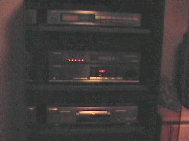 System 2: This is at my Dad's house. This is the A/V rack. Just getting started, I have much to change and add. As you can see! Its a start though! 

Pictured: Yamaha Tuner, Pioneer Receiver, Kenwood DVD Player