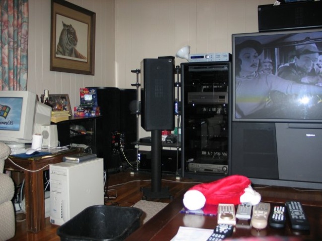 Subs in the corner and my ugly flexi-rack hidden behind the speaker