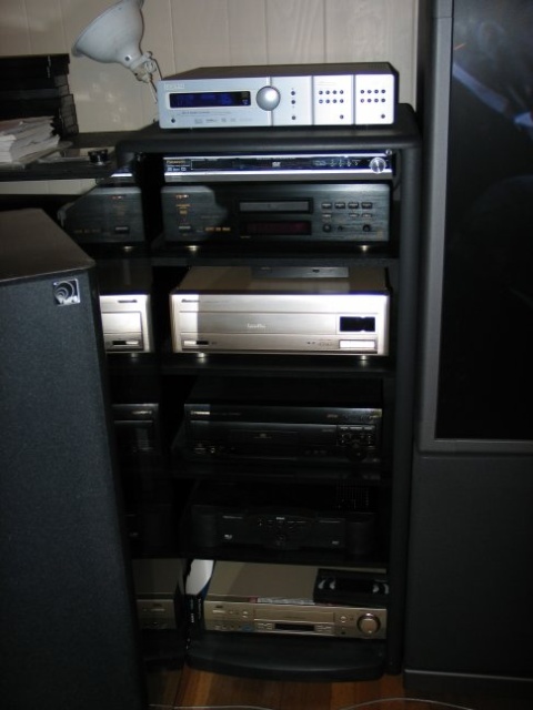 The Rack--Lexicon MC-8, Panasonic RP-82, Denon DVD-2900, Pioneer LD-S9, Pioneer demodulator, Pioneer CLD-D703, Kenwood Demodulator, RCA DTC100, and a semi-retired JVC S-VHS VCR
