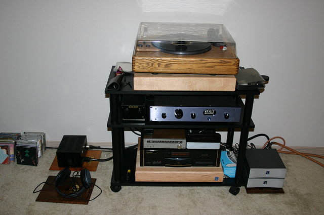 Audio Rack - System as of now consists of a SOTA Sapphire TT, Benz Micro ACE LO, EAR 834P, Manley Shrimp, Rat Shack Tuner, SB3 (stock) w/ Ultimate Mk 2 PS, Pioneer Elite PD-65 cd player, PS Audio UPC-200 x 2, Sennheiser 580 headphones with mostly Canare cables along with AQ and DH Labs on phono section. Power cords are a mixture of Sound String and stock. Maple butcher blocks are 3 inches thick.