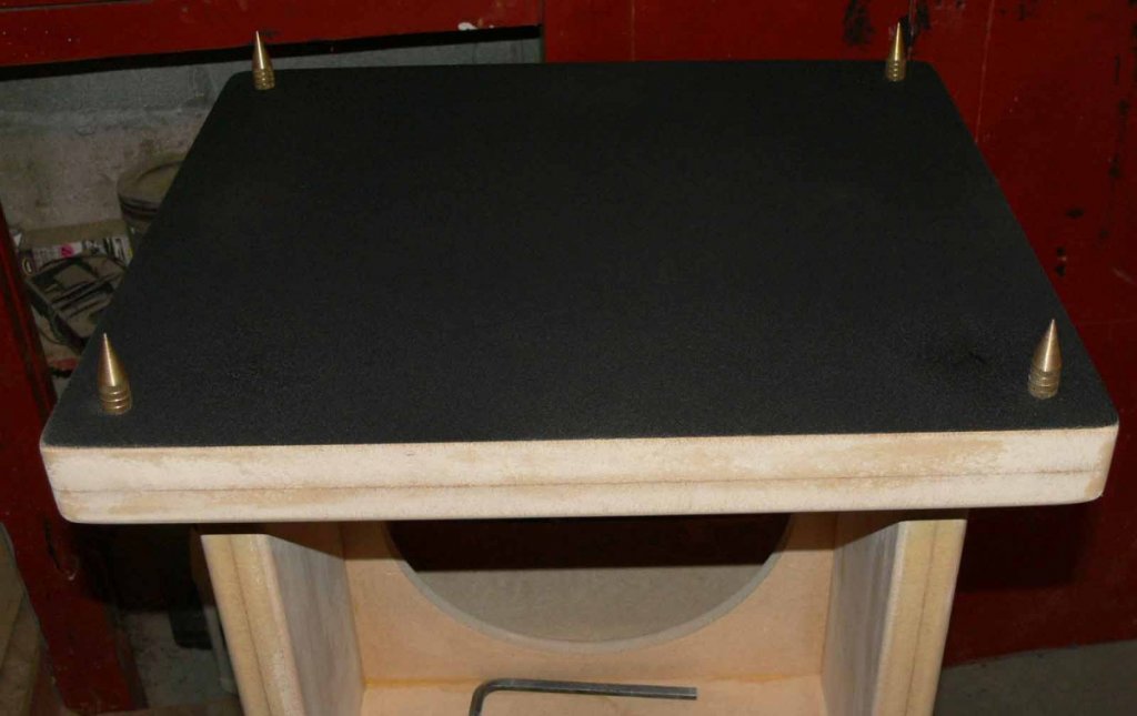 Bases sprayed with bed liner , insets installed, spikes installed