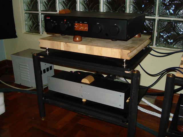 the adcom sits on sound mechanics wooden cones