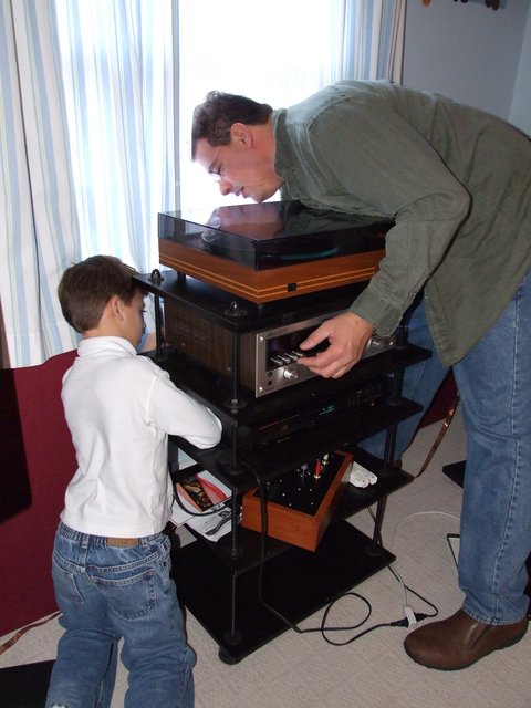 No. 1 son receiving instructions from Dad