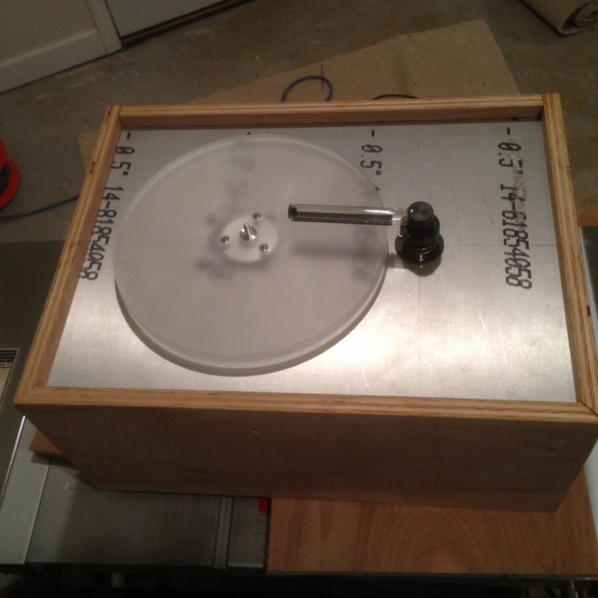 Many, many months after my initial scheme to build my RCM, it has come to life.

You may recall my first idea was to build a straight knock off of the VPI 16.5. That went out the door pretty quick and I decided to implement features of the Typhoon and improve on some areas.

It was to become an unholy monster borrowing ideas from not just VPI but Okki Nokki and Moth vehicles. I couldn't begin to calculate the number of laps I swam while figuring this out. And late nights searching threads and images.

First off, she ain't done yet. Still have lots to do but the intellectual part is accomplished. Electricals, permanent cabinet build and finisihing lie ahead.

But here is what I have to show you: