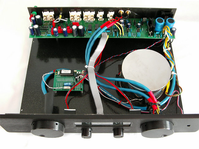 Top view of Odyssey's Tempest SLB preamplifier including remote control circuit - An inside look of Odyssey's Tempest SLB preamplifier with Mu Metal transformer