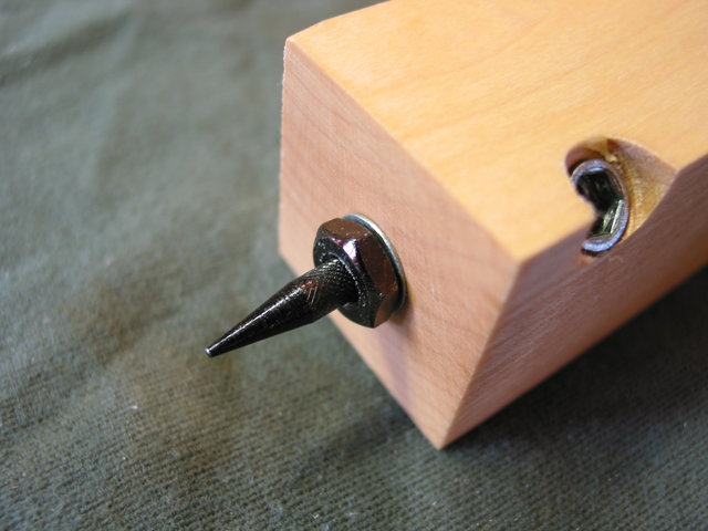 Audio Elegance Carpet Spike Detail - Detail of adjustable carpet spike on rack leg