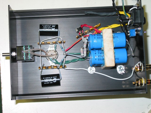 Inside Chassis - partially wired. TKD volume pot, solid maple mount for caps