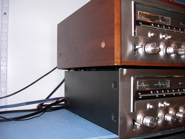 the upper 8010 has the ultra-rare, optional full wood case, IMO it makes the rec. look alot better