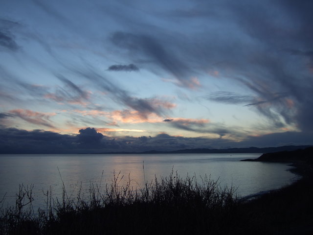 sunset at the waterfront about 5 blocks from where I live, looking west towards Cape Flattery , the northwesternmost point of continental USA