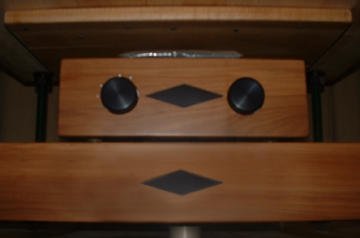 Sugar gum front panels with ebony inlay. Selector switch markings are mother of pearl...