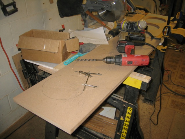 Cutting holes in divider panel