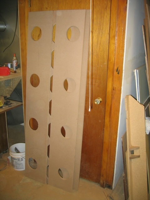 back outer panels leaning against the divider panels