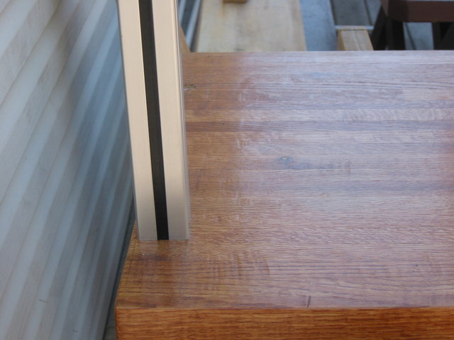 STEP 1: Bolt 8020 posts to underside of top shelf. Don't fully tighten yet.