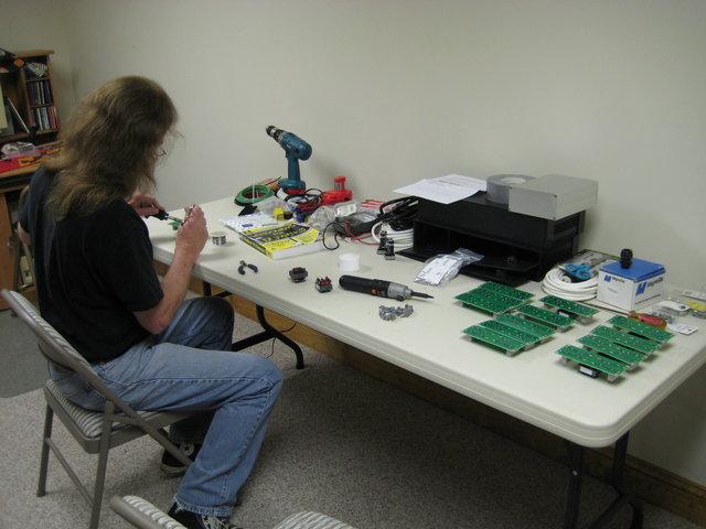 Gordy finishing off a board.
