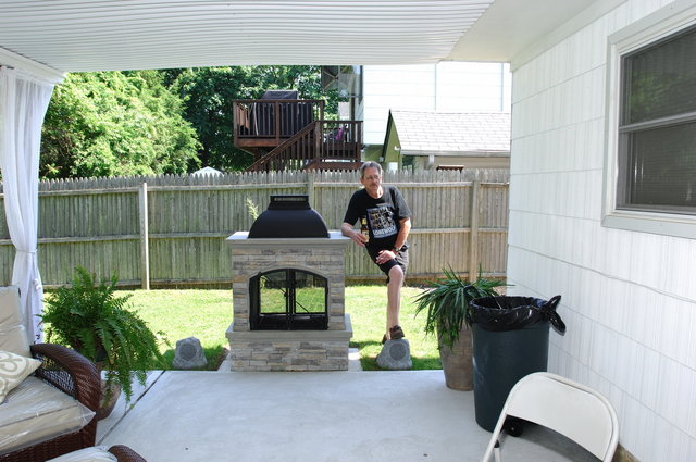 Chris with his foot on the rock speakers