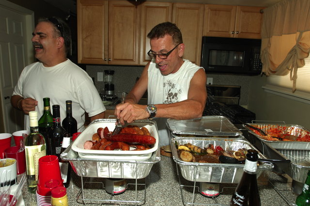 Charles cutting up the sausages