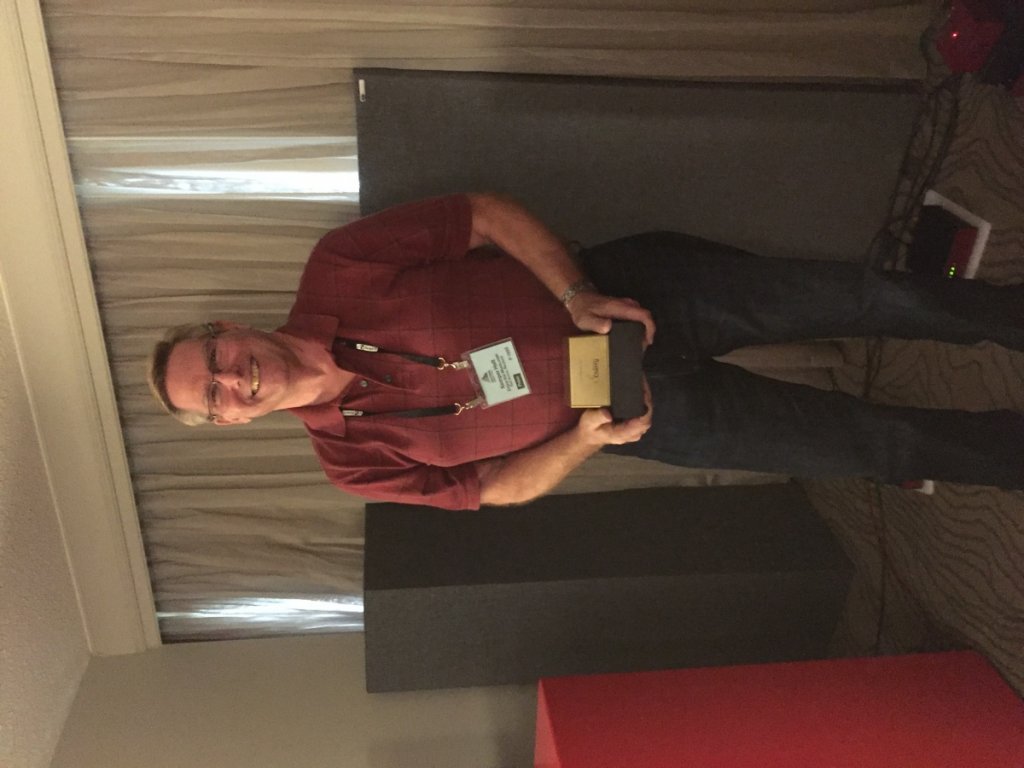 Kemper Holt of Enjoy the Music holding a Golden Cherry Maraschino Monoblock RMAF 2016