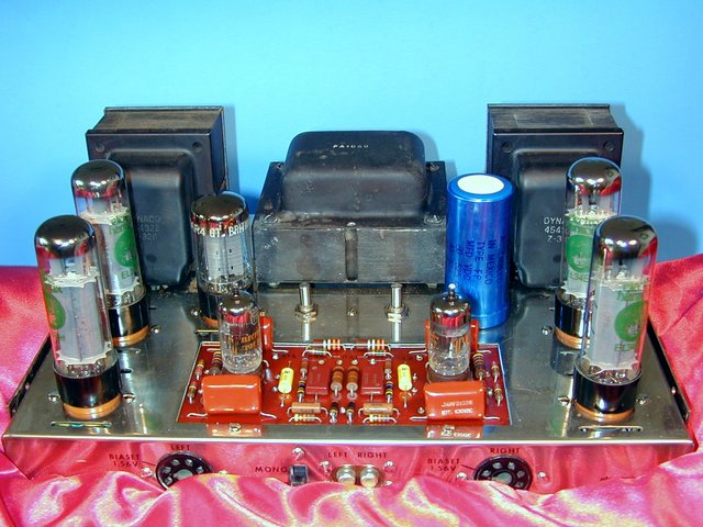 The "Classic" Dynaco Stereo 70 pose - cover removed. - Note the Mullard (branded GE) GZ 34/5AR 4, the two NOS matched RCA 7199's and the factory-matched quad of Electro-Harmonix EL34EH Output tubes. Nothin' fancy here! Just a good, solid, dependable amplifier.