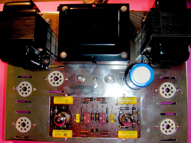 Completed Stereo 70 - "Don't Call Me 'Dimples'!" - Ceramic octal sockets - Here is a "View From the Top" of "Don't Call Me 'Dimples'!" I removed the octal tubes so you could get a good look at the ceramic tube sockets. These sockets grip the tube pins REALLY well and there is NO chance that the sockets will melt or distort - EVER!
