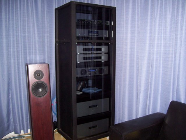 My audio system as end of august 2008 - From top to bottom: 

Behringer Ultrafex EX 3200
Cary CD 303/300
(2) PS Quintessence
Odyssey Tempest SLB Extreme
Odyssey Stratos Mono Extreme
Odyssey Lorelei (speakers)