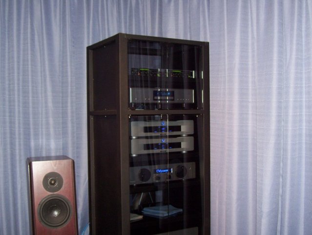 My audio systema as end of august 2008 - From top to bottom: 

Behringer Ultrafex EX 3200
Cary CD 303/300
(2) PS Quintessence
Odyssey Tempest SLB Extreme
Odyssey Stratos Mono Extreme
Odyssey Lorelei (speakers)