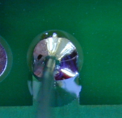 Typical solder joint - Here is a typical "good" solder joint. It is clean and shiny. (Actually, the photo isn't the best. It really looks MUCH shinier!) It doesn't take a huge blob of solder. Just enough to flow around the lead completely.