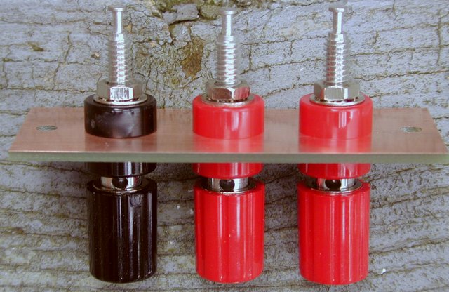 Audio by Van Alstine "Ultimate Stereo 70" Upgraded Output Connectors - Top View - Here is a picture of the assembled Upgraded Output Connectors for the "Ultimate Stereo 70" rebuild. Note that the holes in the posts are aligned vertically to minimize the chance of a short between wires and to allow the use of "pin plugs."