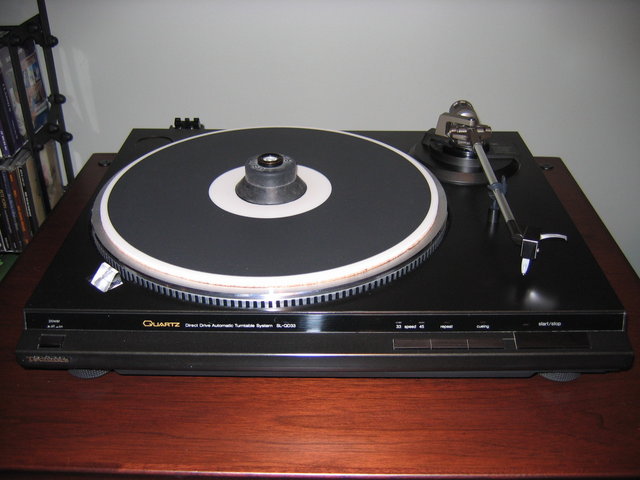 Current State of Tweakage - KAB Ortofon OMB-20 Cartridge
Herbie's Way Excellent Turntable Mat
ART Blues Interconnects from KAB
Record Clamp from KAB
Bright Star IsoNode Isolation Feet
Plasti Clay (plinth) and rubberized undercoat (platter)
Tri Flow Teflon Bicycle Lube