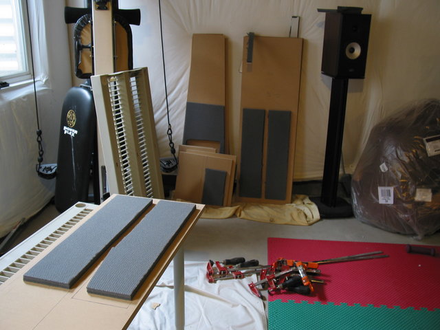 Putting some Sonic Barrier Acoustic Foam on before assembly - I highly recommend doing this before assembly