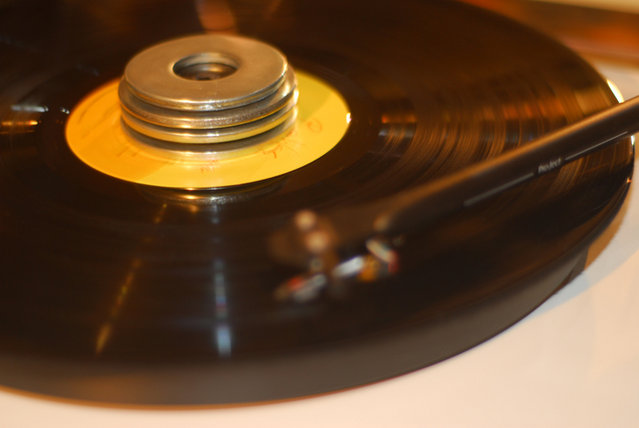 DIY Record Clamp - My own design, Steal Washer and Rubber washers stuck together. Look pretty good and effective. Its not balanced though....lol