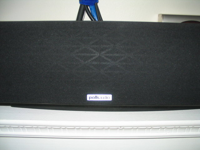 Polk Surroundbar closeup - The grill is in perfect condition. You normally can't see the frame but the photo flash just blasts right through the grill.