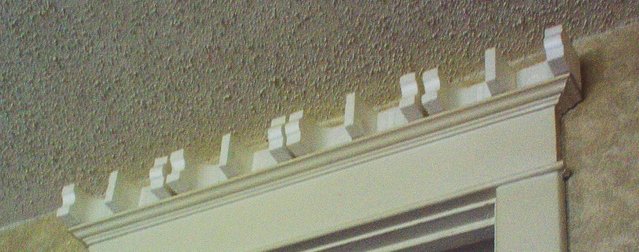 Over the door sound absorbant Styrofoam DIY - Packaging materials recycled to absorb standing waves in the corners without detracting too much from the aesthetics of the room's decor. This is the prototype in the raw...it works ! I've noticed a small, but noticeable improvement for no $$$