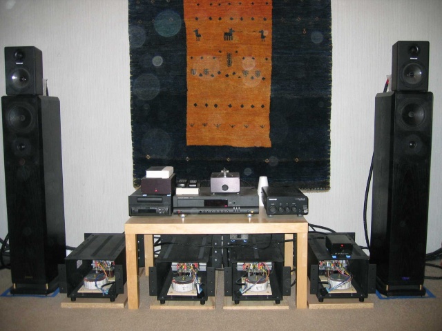 Primary System: Stock CAL Delta Transport, Bolder-modifed ART DIO Mensa, AKSA TLP Nirvana , 4 AKSA 100W Nirvana monoblocks bi-amping Mission 754 Freedom 5 speakers. Secondary System: modified Harman Kardon CD Transport, modified Video Logic Pro with built-