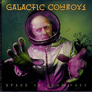 Galactic Cowboys SIYF - These guys were one of the first metal bands I ever saw in concert. This album is only okay, but the cover art kicks ass. I love the purples and greens. Top notch rendering.